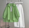 parrot green Button down shirt with white wideleg jeans