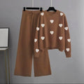 brown tracksuit with (white hearts)