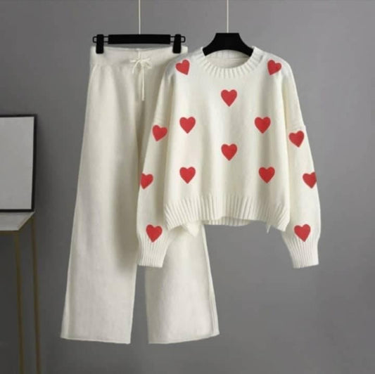 white tracksuit with (red hearts)
