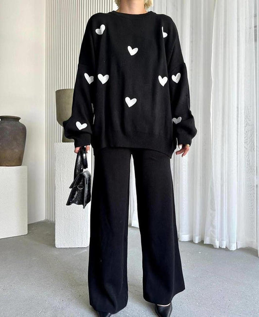 black tracksuit with (white hearts)