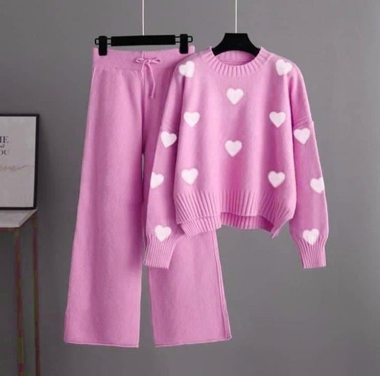 pink tracksuit with (white hearts all over)