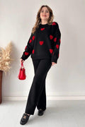 black tracksuit with (red hearts all over)