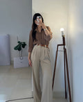 beige formal pants with brown button down shirt