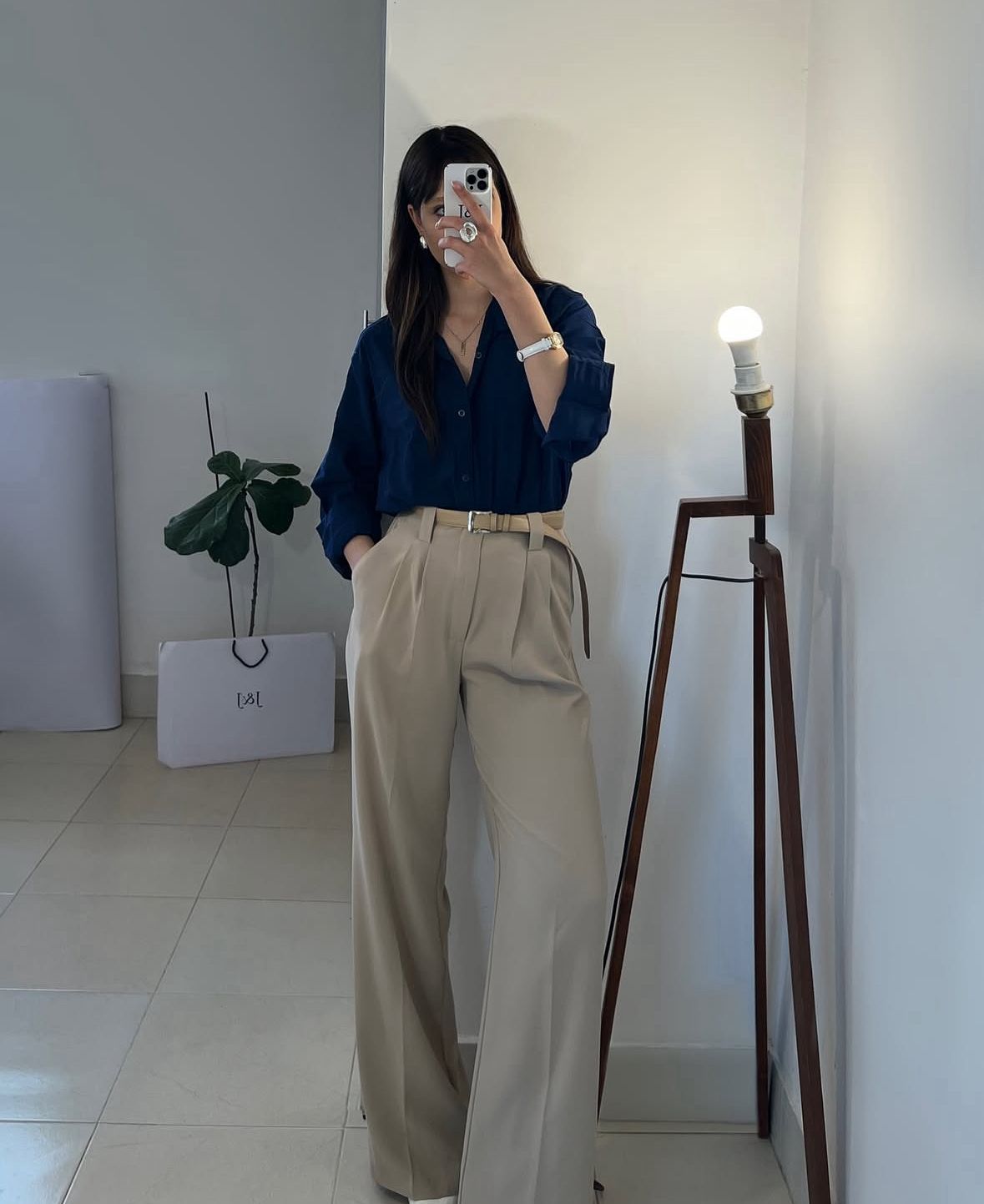 beige formal pants with navyblue button down shirt