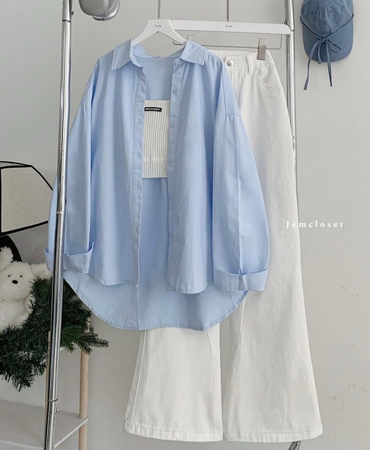 skyblue button down shirt with white wideleg jeans