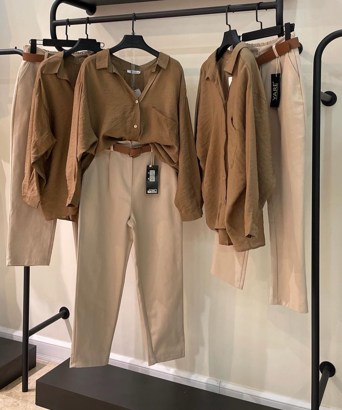 brown button down shirt with beige wideleg jeans