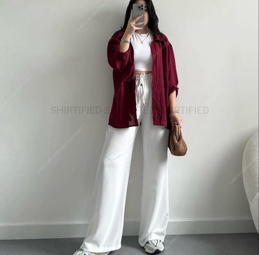 maroon button down shirt with white wideleg jeans