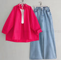 shocking pink button down shirt with iceblue wideleg jeans