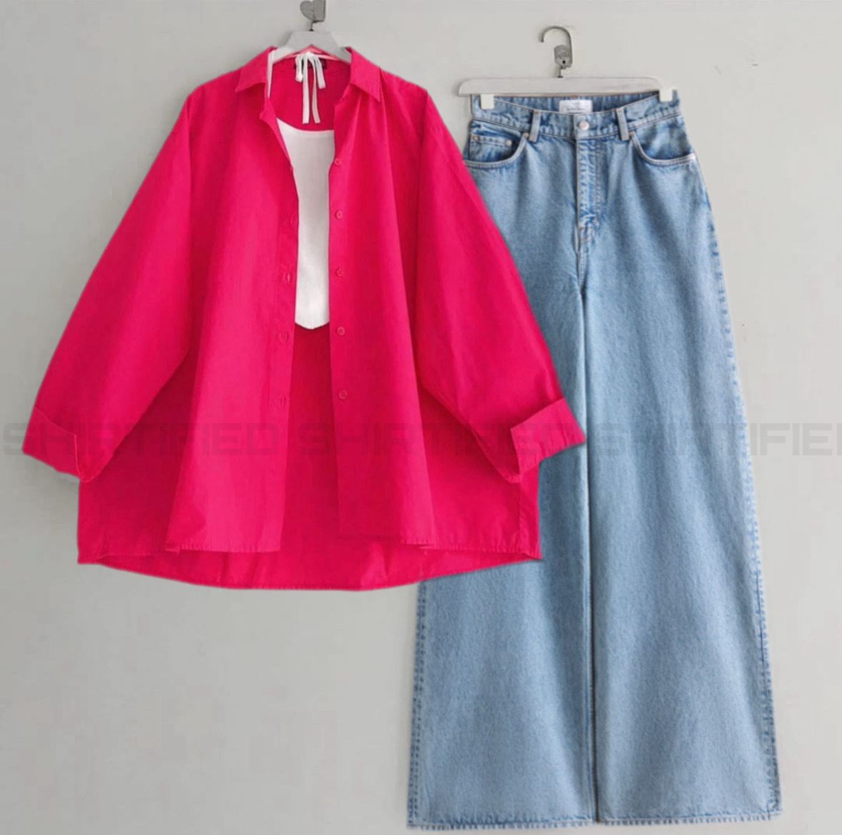 shocking pink button down shirt with iceblue wideleg jeans