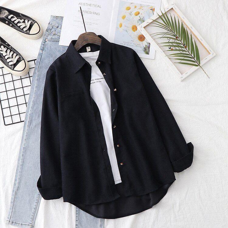 Black Button down shirt with iceblue jeans