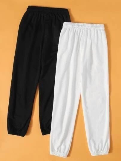 white and black Trousers