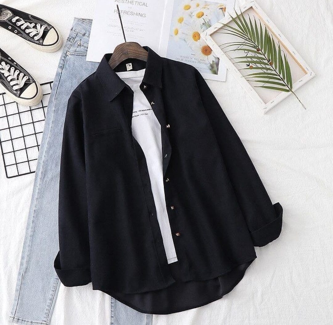 Black Button down shirt with iceblue jeans