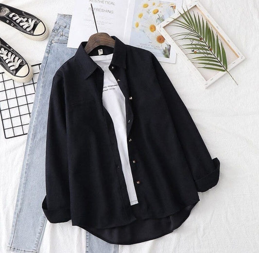 Black Button down shirt with iceblue jeans
