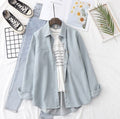 Light blue Button down shirt with  iceblue wideleg jeans